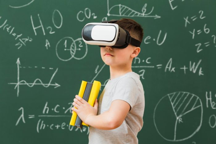 Future of Common Core Math-  young boy wearing VR set